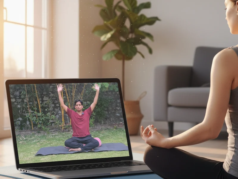 A student participating in a live online yoga class with Raj Yoga Rishikesh