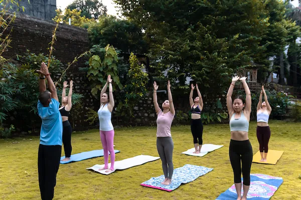 Group meditation session at Raj Yoga Rishikesh for a 5-day yoga retreat